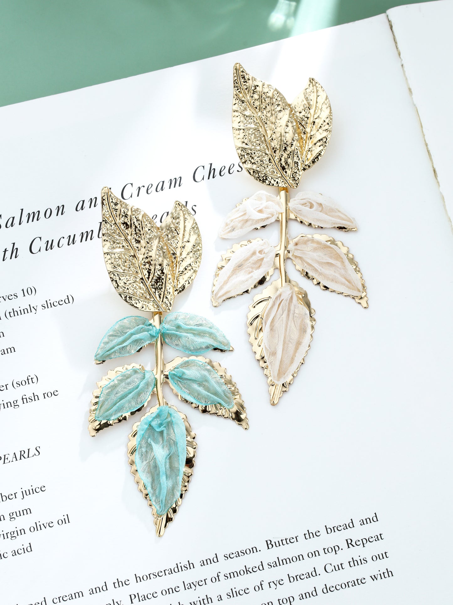 S5182E1 Mismatched Leaf earrings