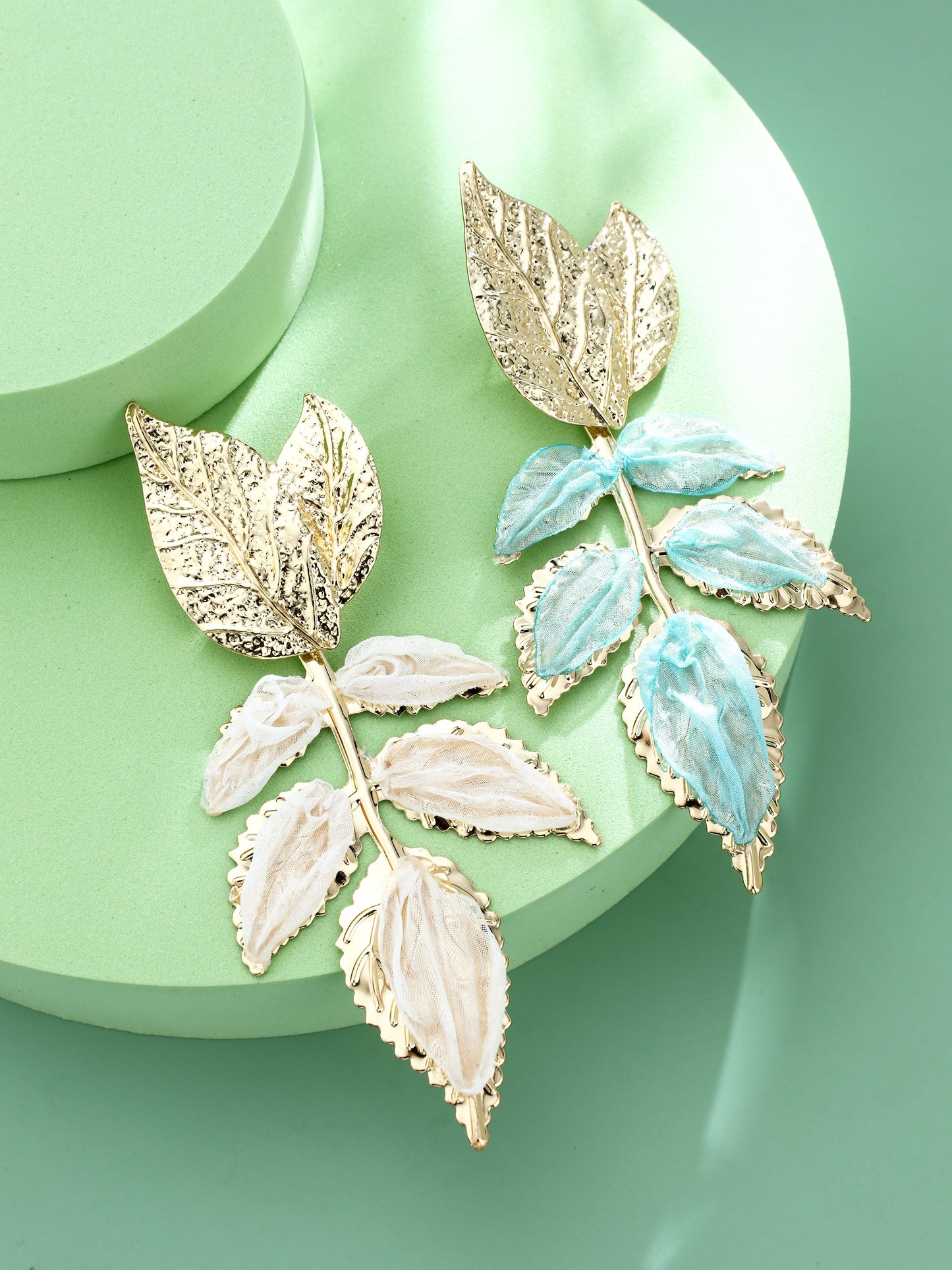 S5182E1 Mismatched Leaf earrings