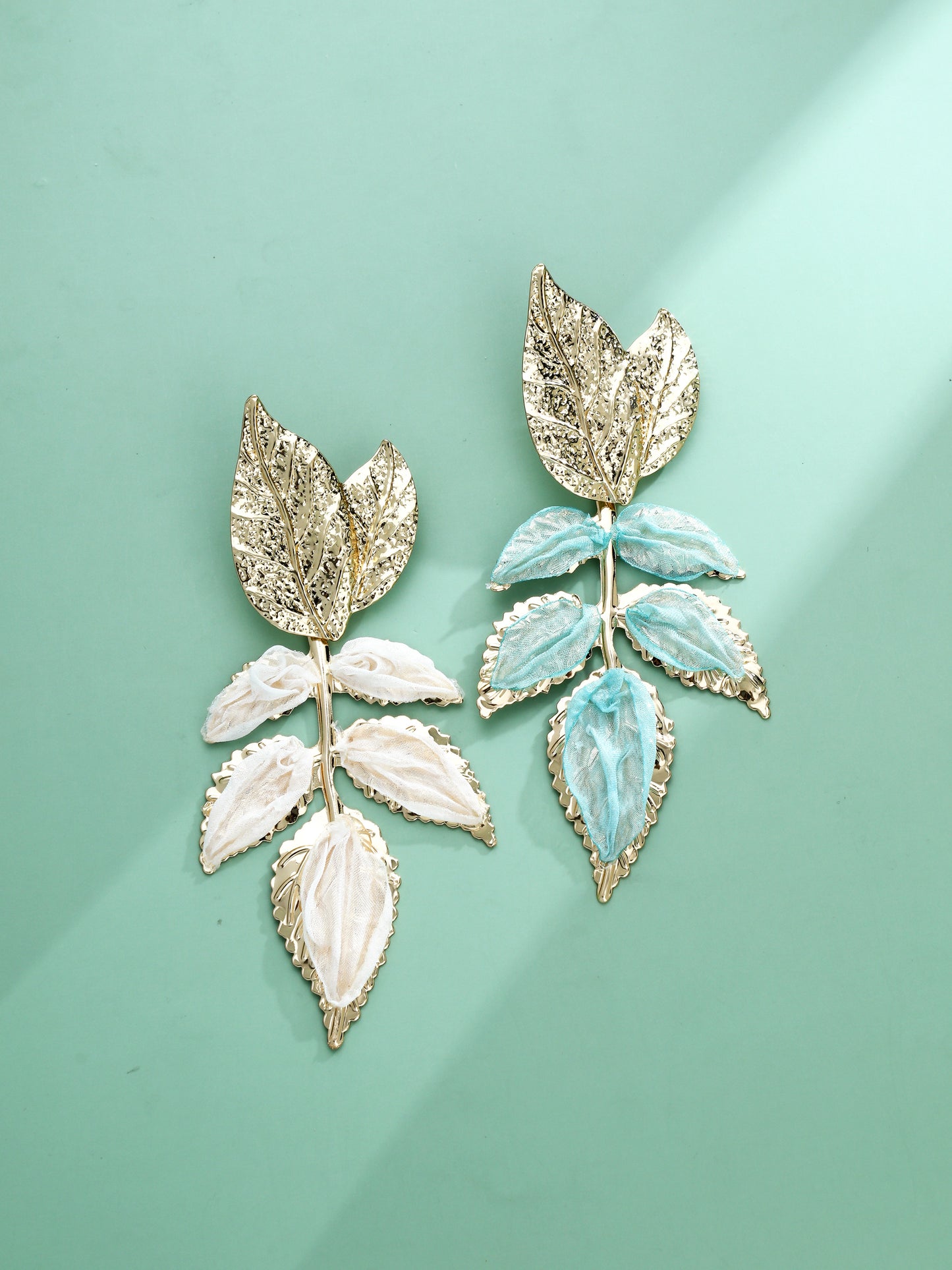 S5182E1 Mismatched Leaf earrings